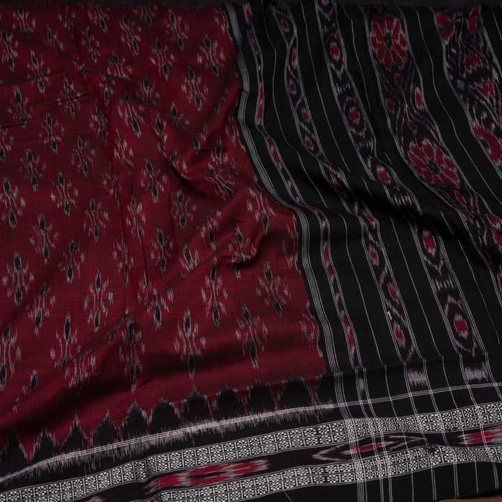 Closeup of Handwoven maroon and black pallu ikkat cotton Saree