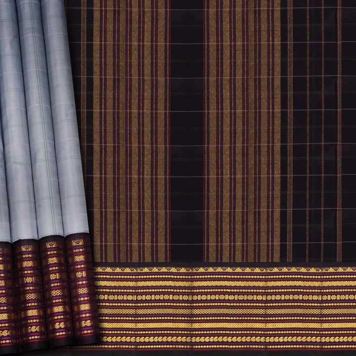 Textile with brown and gold patterned border