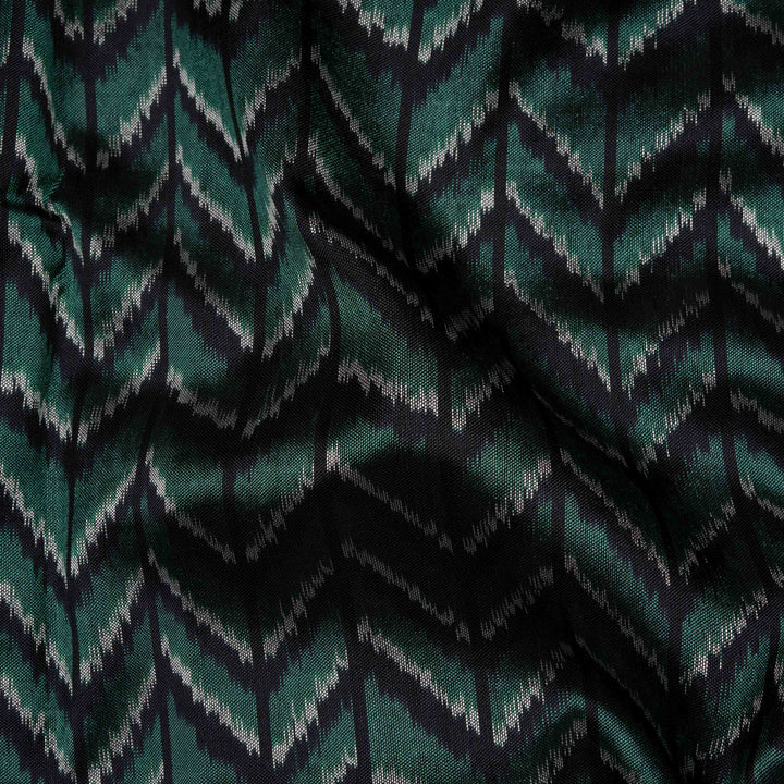Closeup of Handwoven black Ikkat silk Saree