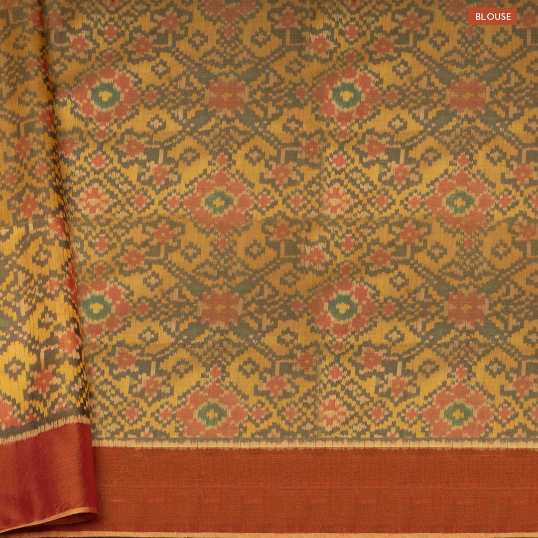 Blouse of Handwoven moss grey and orange Ikkat silk Saree