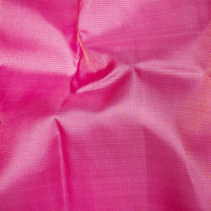 Close-up of pink fabric with a textured surface
