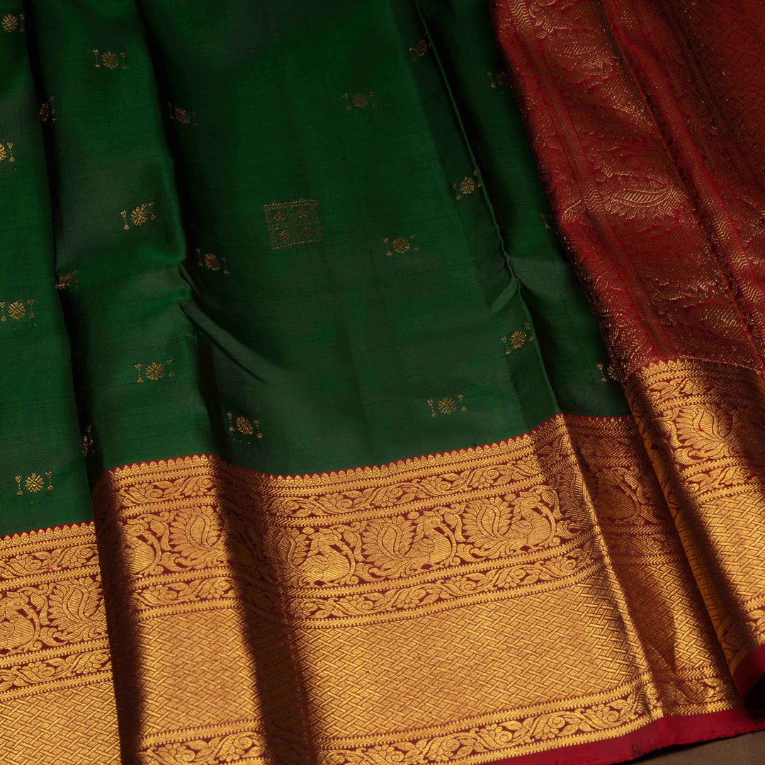 Green and red saree with gold border
