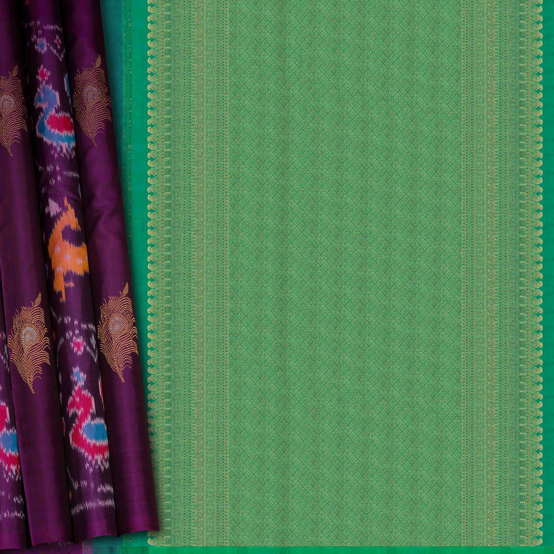 Green fabric with a textured pattern next to a purple fabric with peacock designs.