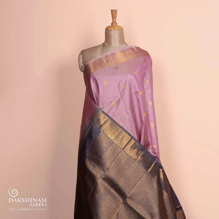Pleats/body of Handwoven pastel pink and grey kanjivaram silk Saree