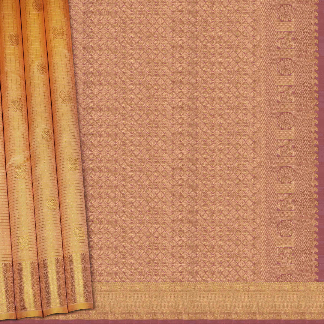 Brown saree with a subtle pattern and gold border