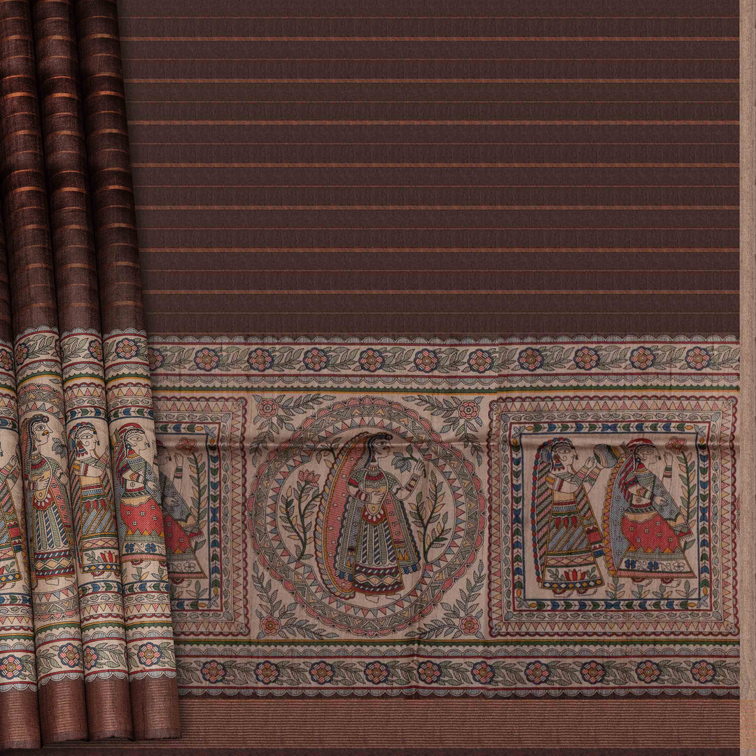 Textile with intricate patterns and figures on a brown background