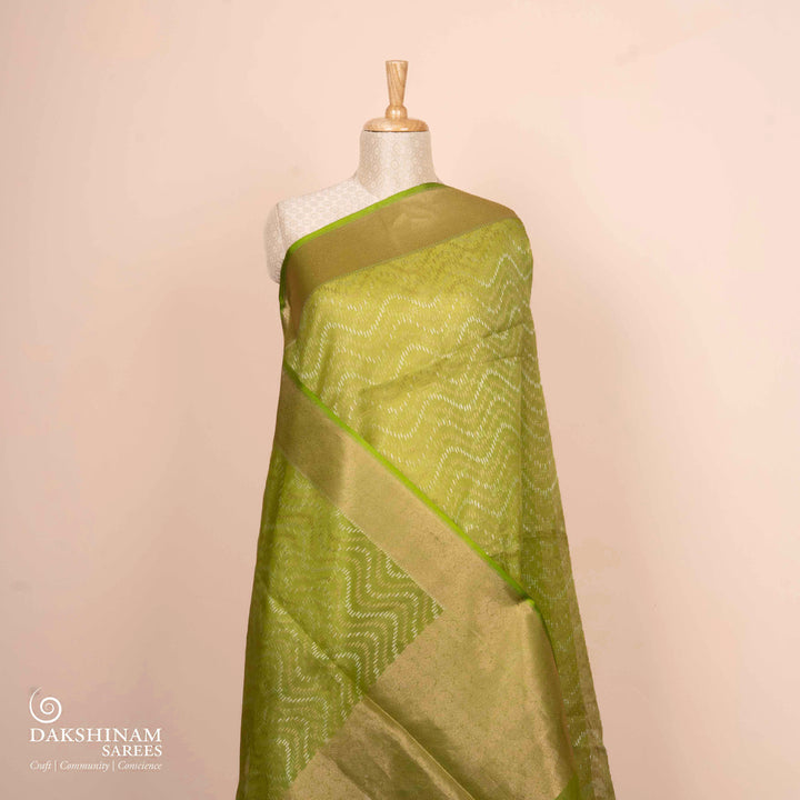 Pleats/body of Handwoven lime green kora silk Saree