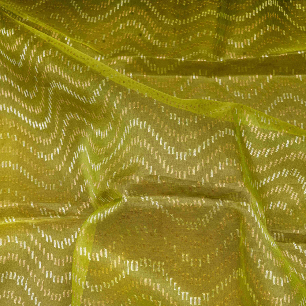 Close-up of green fabric with a subtle pattern
