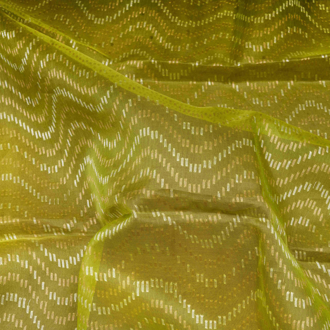 Close-up of green fabric with a subtle pattern