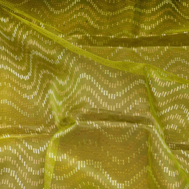 Close-up of green fabric with a subtle pattern