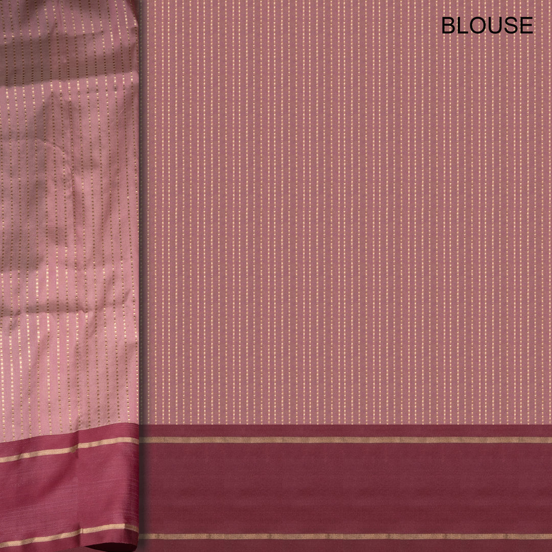 Maroon and gold traditional blouse fabric with a subtle pattern