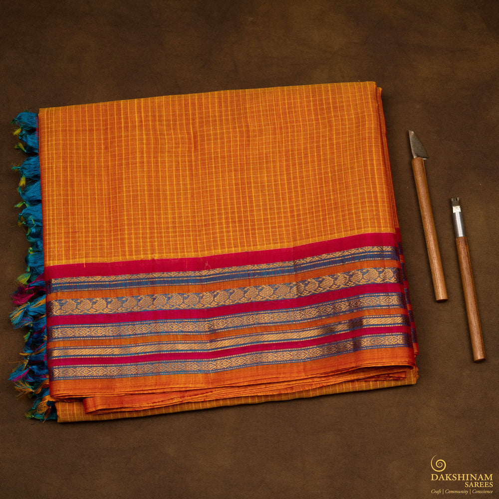 Folded handwoven Gadwal Silk Cotton Saree