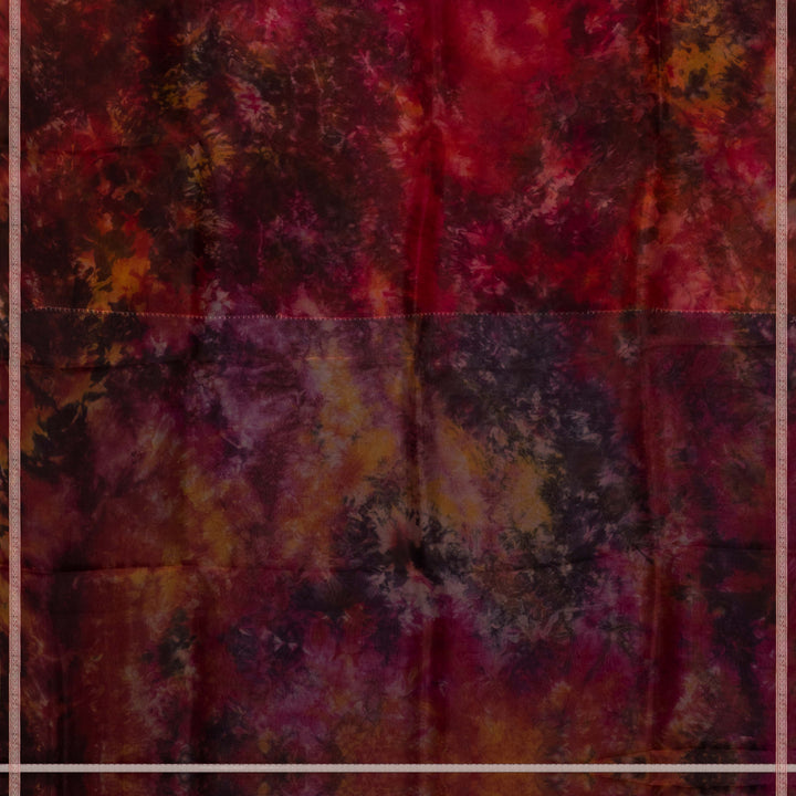 Body closeup of Handwoven maroon organza silk saree with abstract multicolour patterns and zari-lined border.