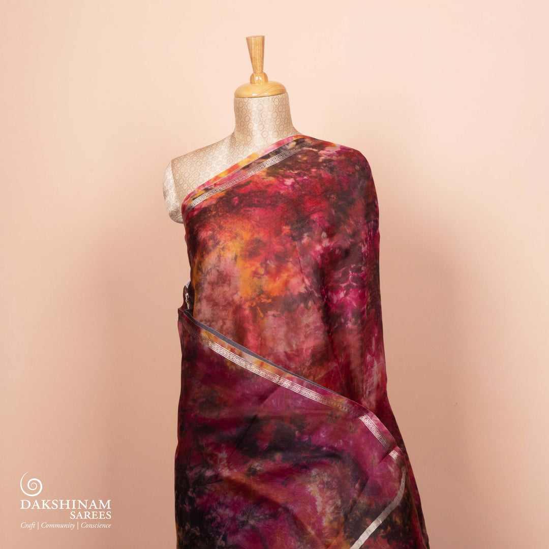 Full view of Handwoven maroon organza silk saree with abstract multicolour patterns.