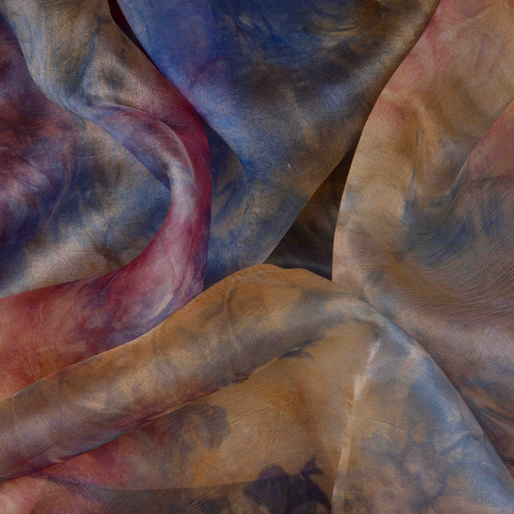 Closeup view of a Handwoven organza silk saree in sky blue with multicolour abstract strokes.