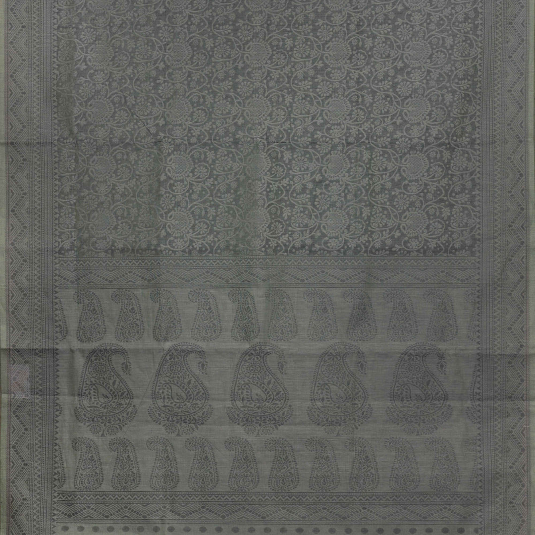 Body closeup of Handwoven grey South cotton saree with floral vines, chevron lines, stripes, paisleys, and dotted motifs.