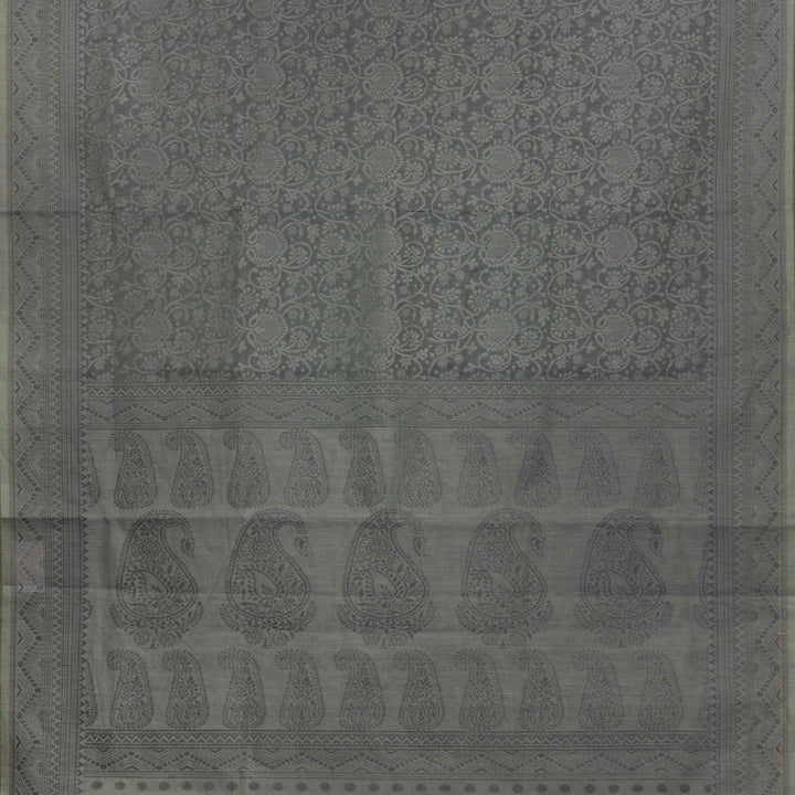 Body closeup of Handwoven grey South cotton saree with floral vines, chevron lines, stripes, paisleys, and dotted motifs.
