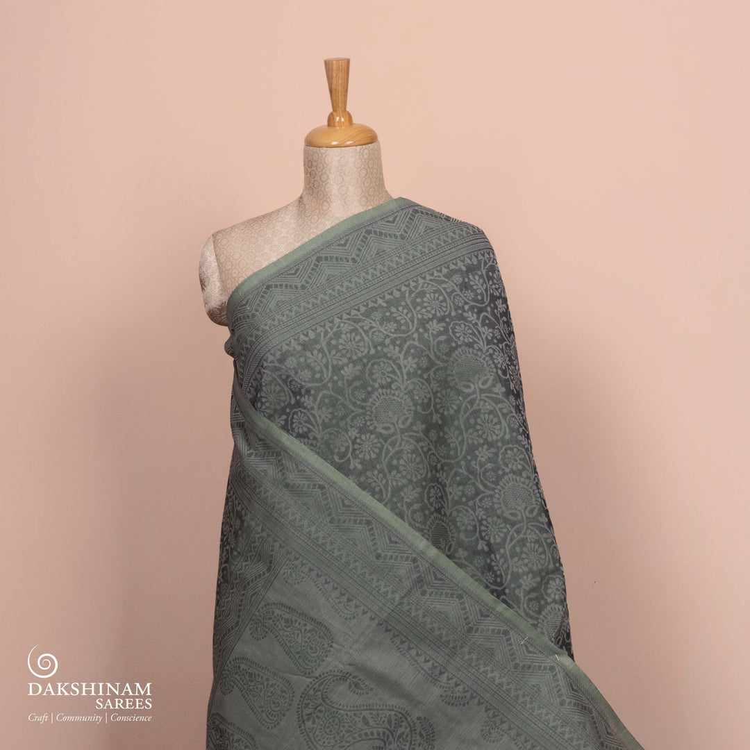 Full view of Handwoven grey South cotton saree with floral vines.