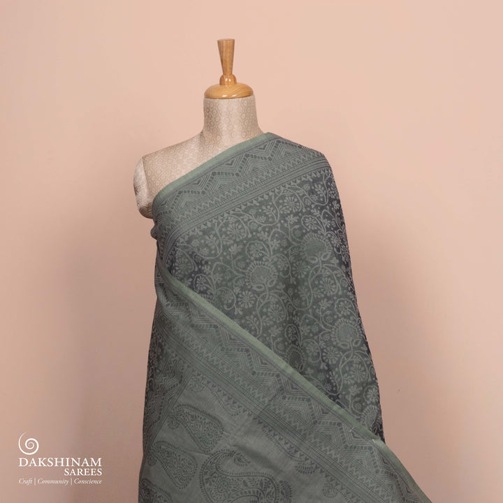Full view of Handwoven grey South cotton saree with floral vines.