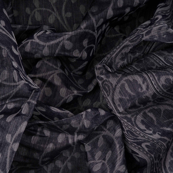 Body closeup view of a Authentic grey South cotton saree with floral vines, stripes and plant motifs.