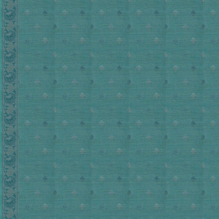 Closeup of a Handwoven aqua blue South cotton saree with diamond-shaped patterns, sunflower and leafy motifs, monotone border  blouse.