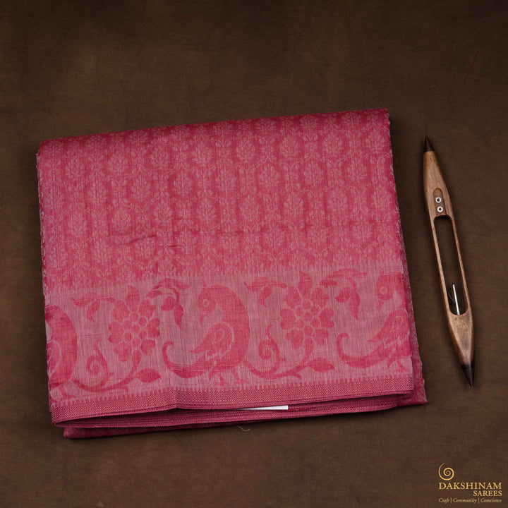 Full view of a Handwoven pink South cotton saree with parrots.