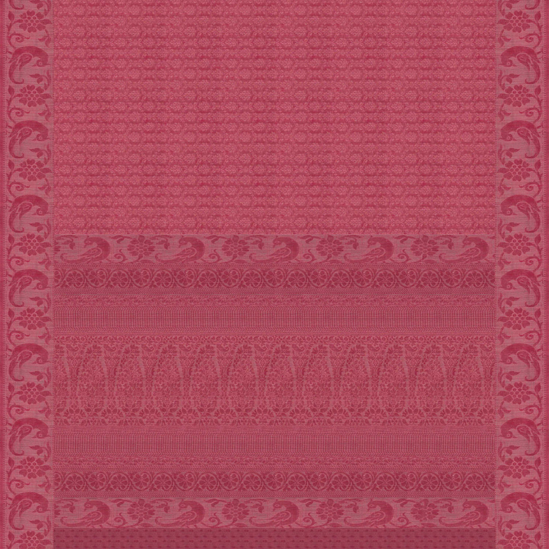 Full body closeup of a Handwoven pink South cotton saree with parrots, floral vines, paisleys, chevrons, stripes and dotted motifs.