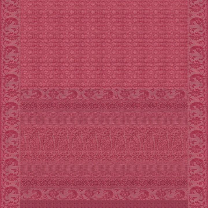 Full body closeup of a Handwoven pink South cotton saree with parrots, floral vines, paisleys, chevrons, stripes and dotted motifs.