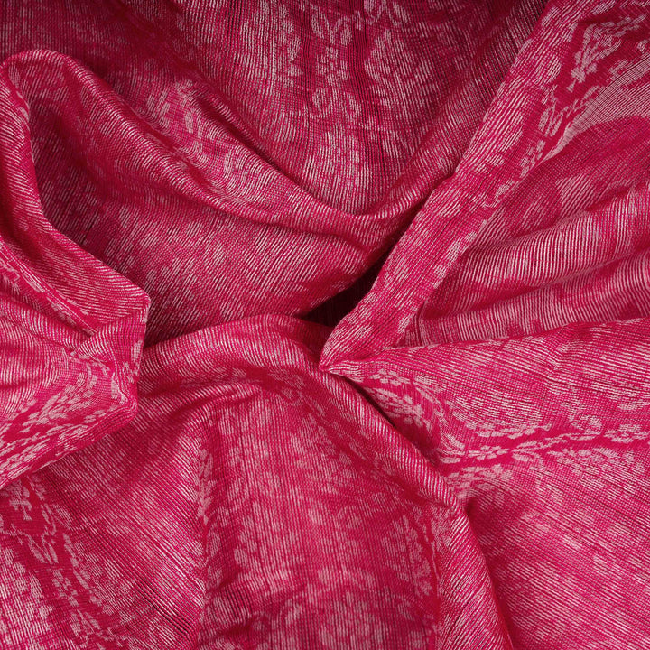 Closeup of a Handwoven pink South cotton saree with parrots.