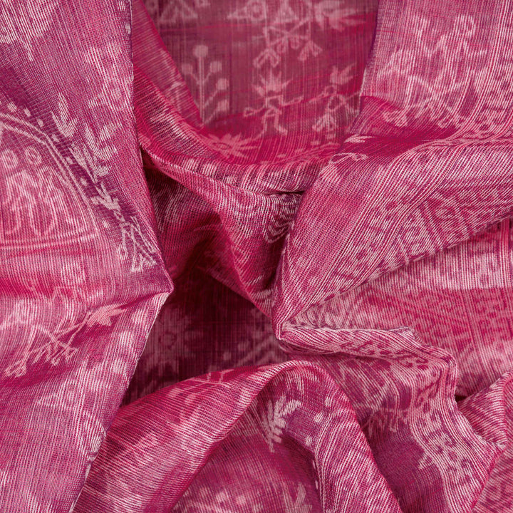 Closeup view of a Authentic pink South cotton saree with hut motifs.
