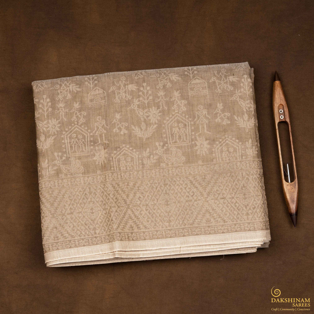 Closeup view of a Authentic beige South cotton saree with hut-shaped motifs, birds, diamond patterns, and stripes with monotone border.