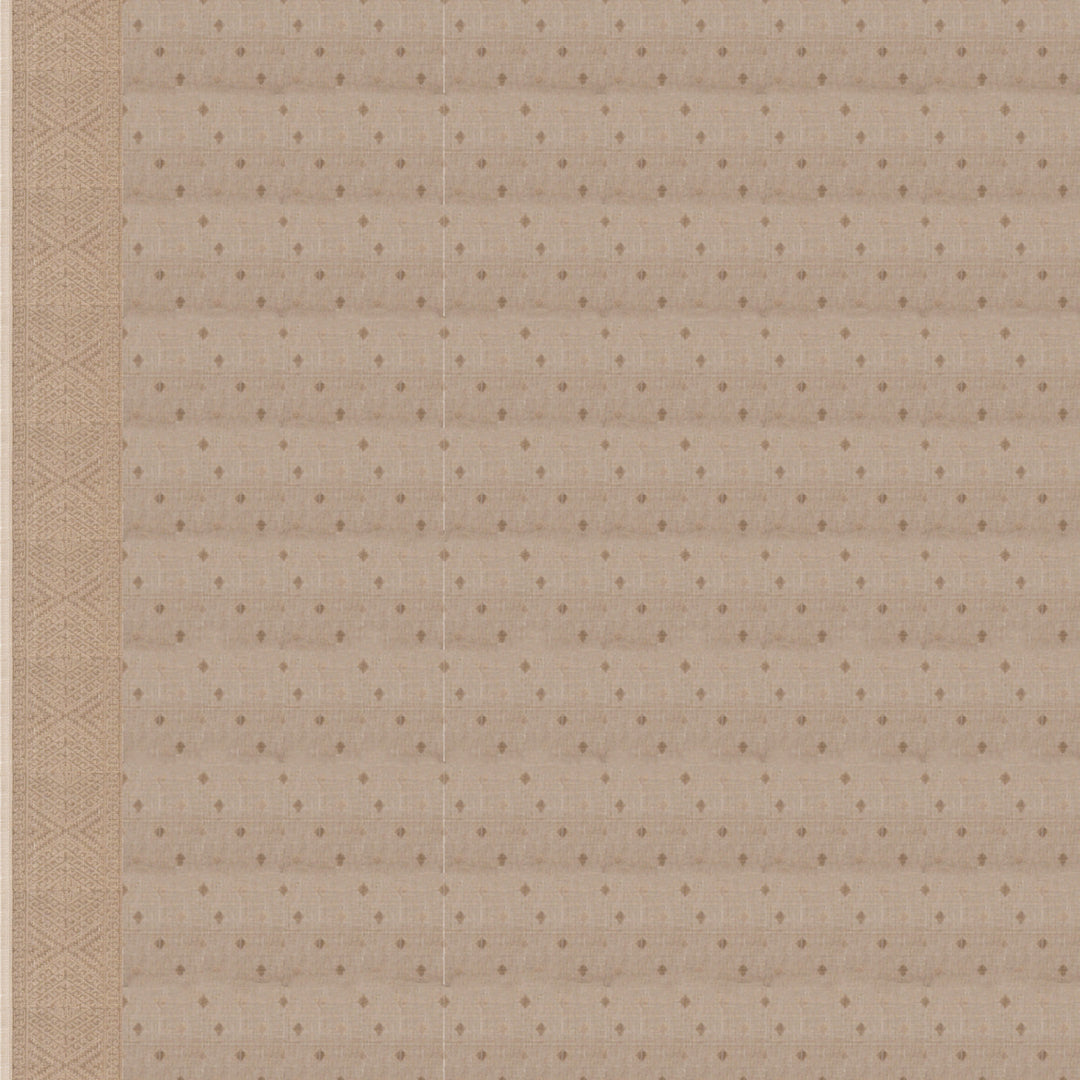 Blouse closeup of a Authentic beige South cotton saree with hut-shaped motifs, diamond patterns, and stripes with monotone border.