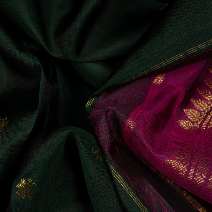 Closep of  Handwoven Bottle Green with purple Kanjivaram silk Saree