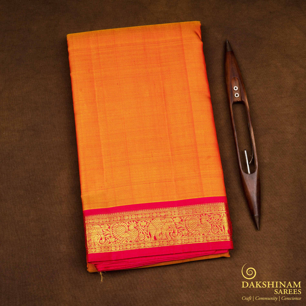 Folded Handwoven Orange with pink Kanjivaram silk Saree