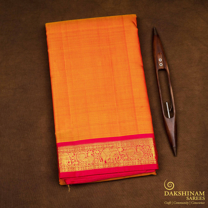 Folded Handwoven Orange with pink Kanjivaram silk Saree