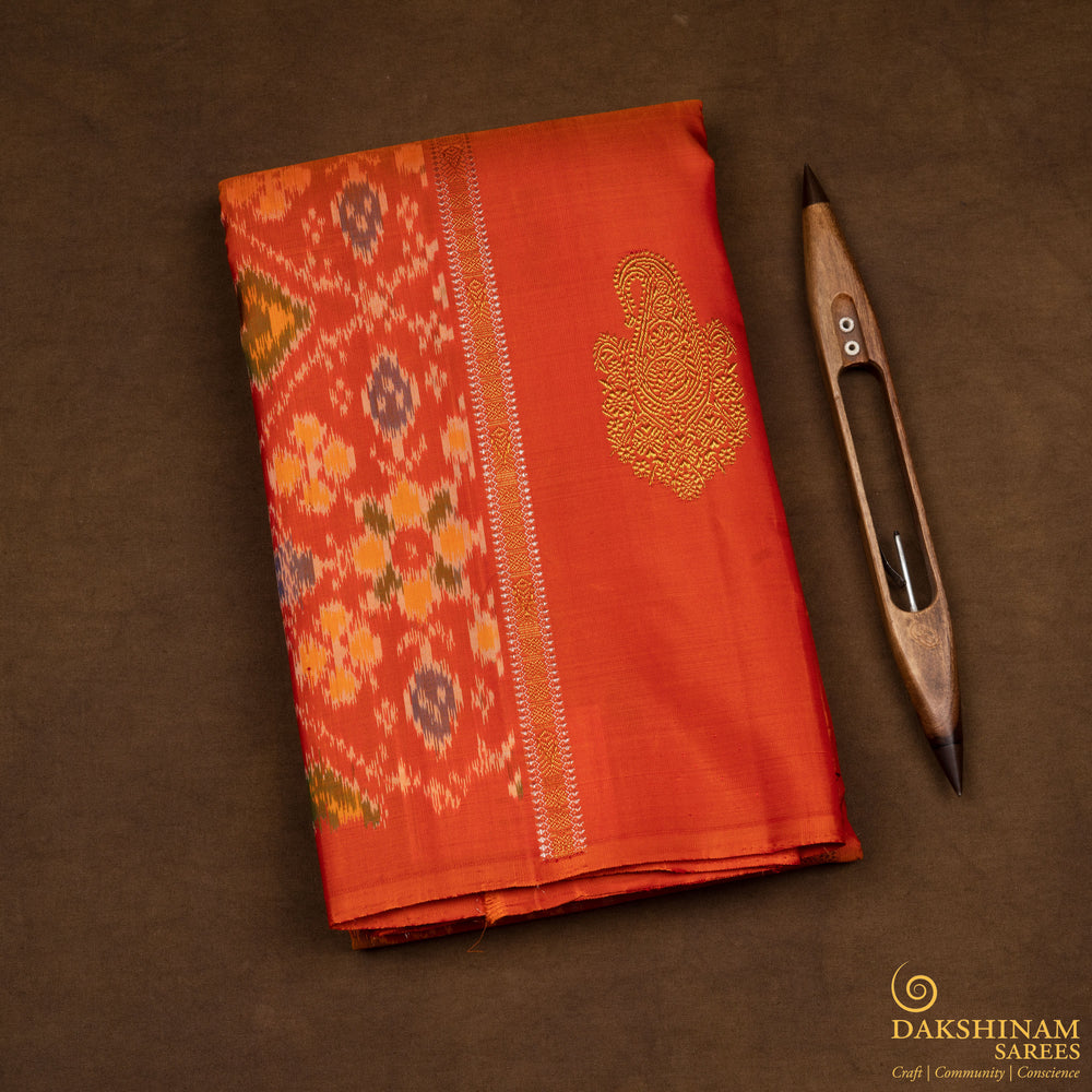 Folded Handwoven Orange borderless Ikat Kanjivaram silk Saree