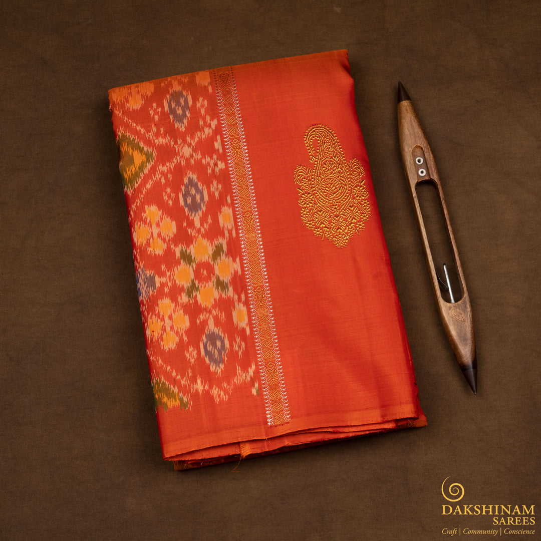 Folded Handwoven Orange borderless Ikat Kanjivaram silk Saree