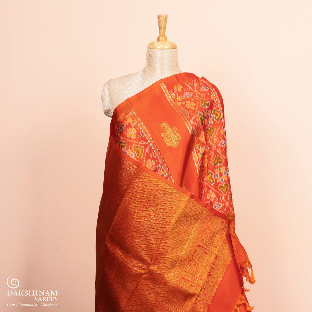 Pleats/body of Handwoven Orange borderless Ikat Kanjivaram silk Saree