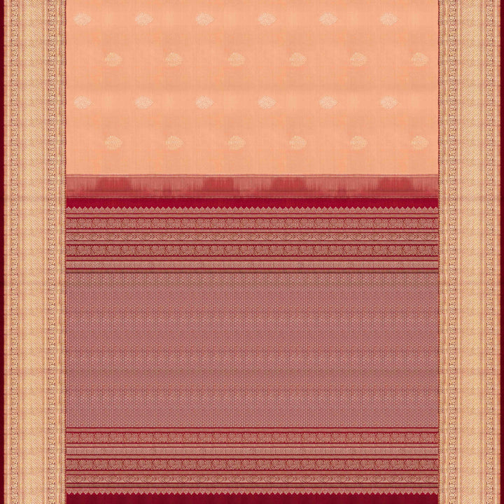 Body pallu Closeup view of a Peach Kanjivaram silk saree with maroon korvai border.