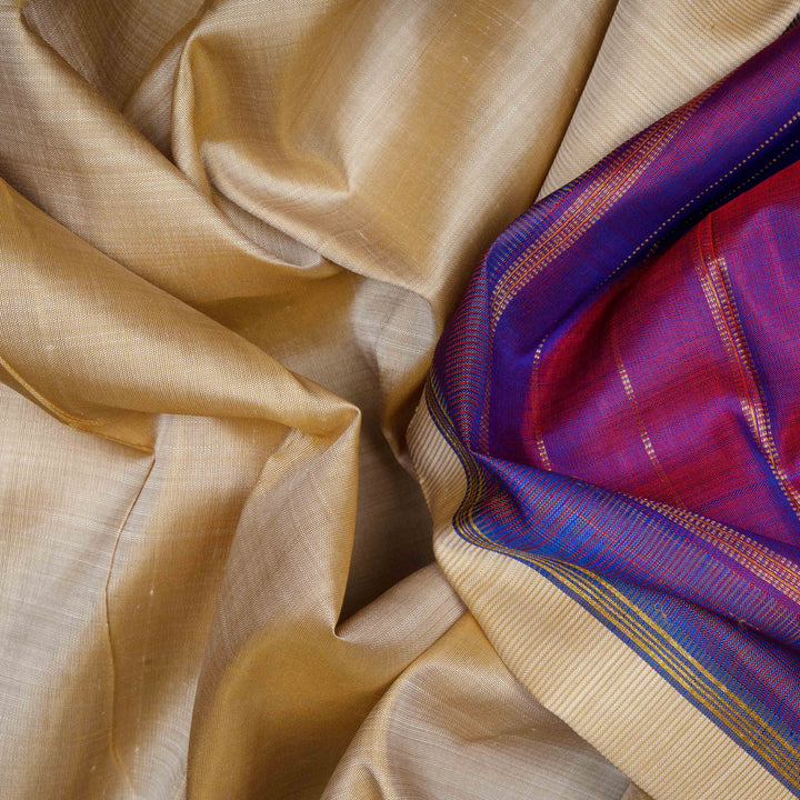 Body closeup of a Beige Kanjivaram silk saree with magenta korvai temple border.
