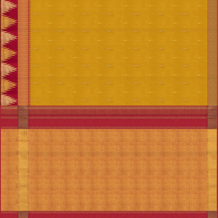 Body pallu Closeup of a Yellow Korvai Kanjivaram silk saree with red temple border.