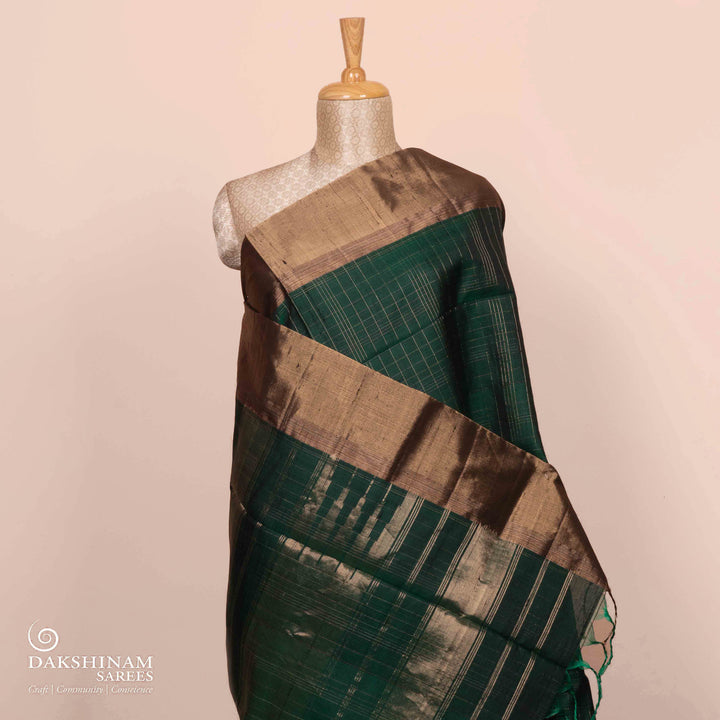 Pleats/body of  Handwoven bottle green dupion soft silk Saree