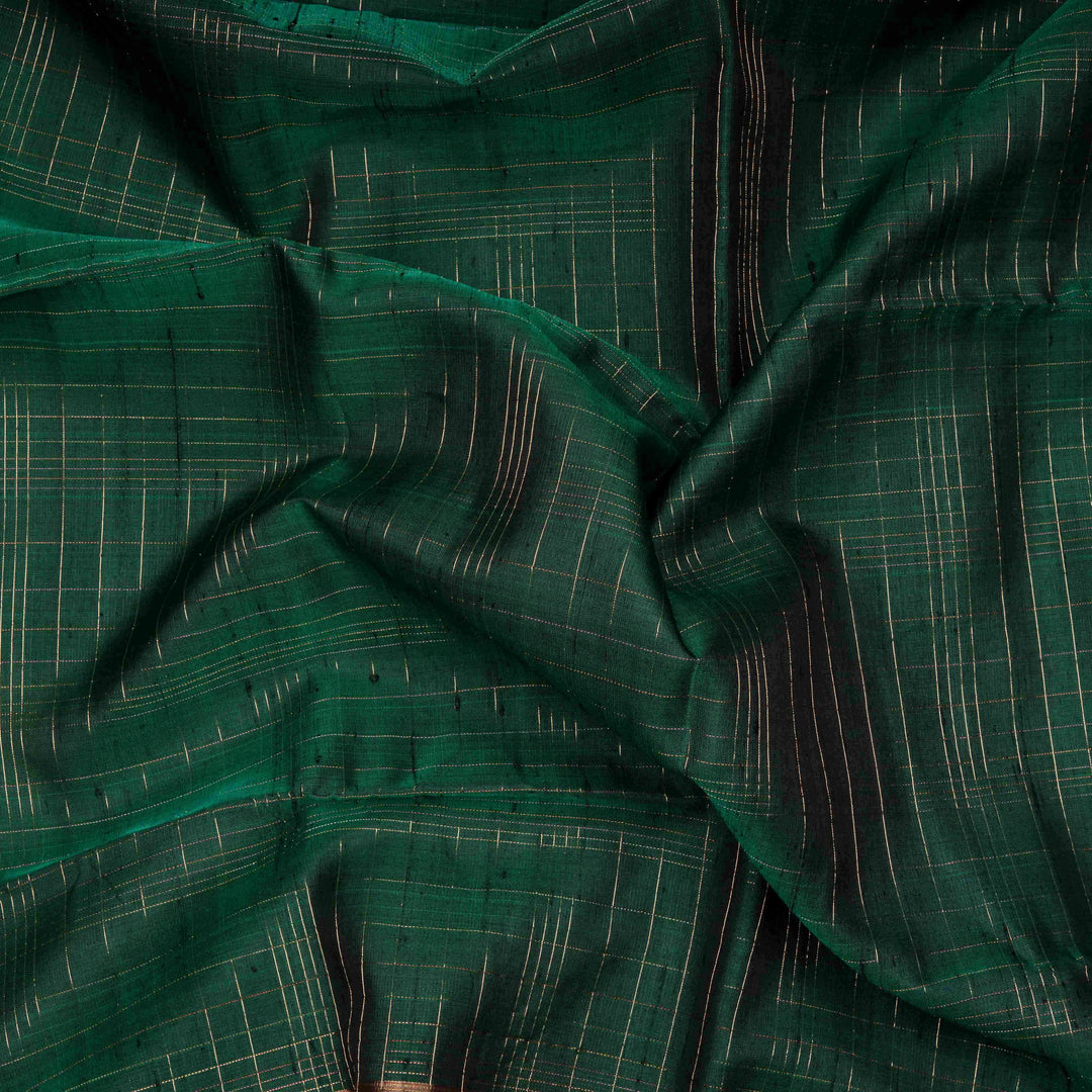 Close-up of green fabric with a subtle pattern