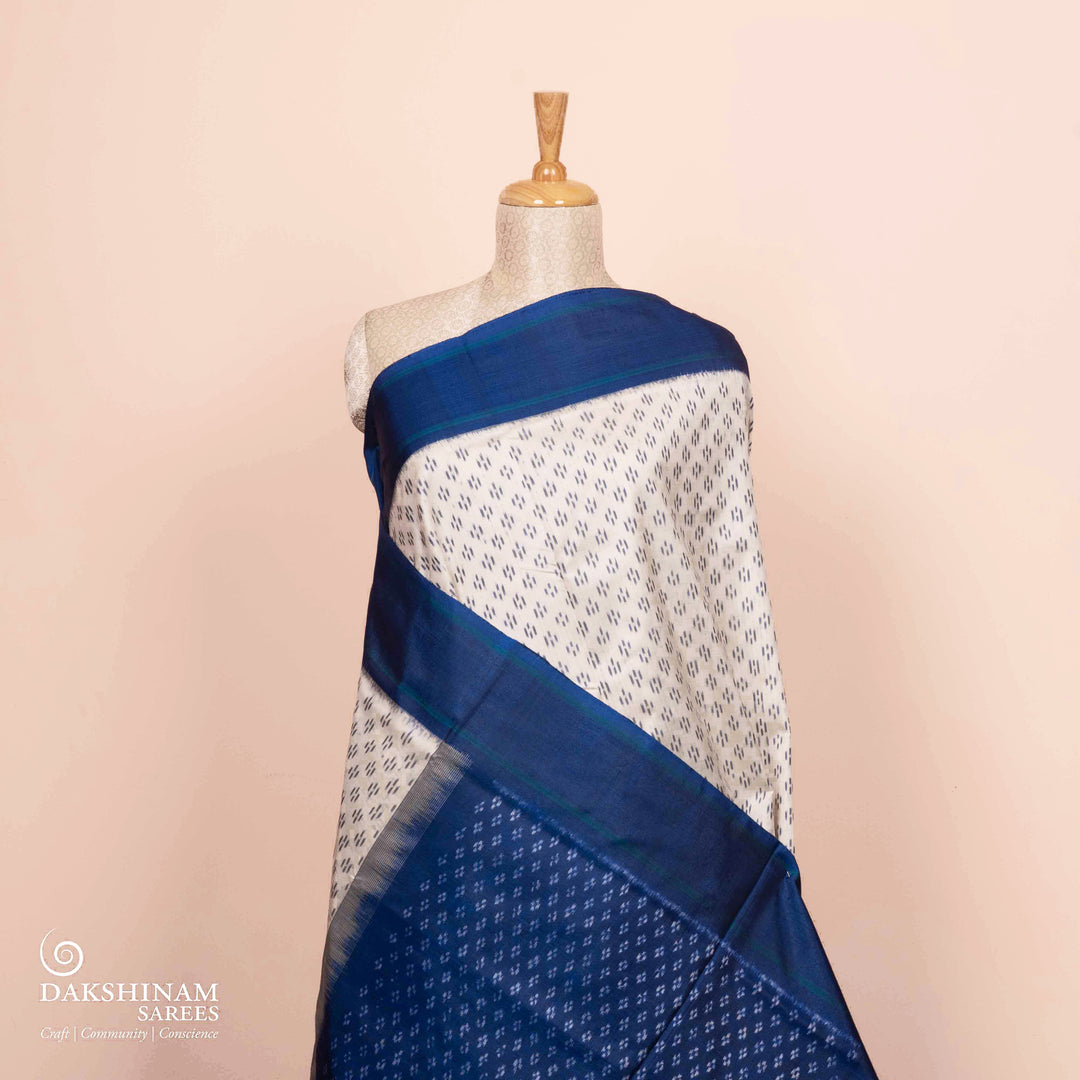 Pleats/body of Handwoven White with Blue Ikat silk Saree