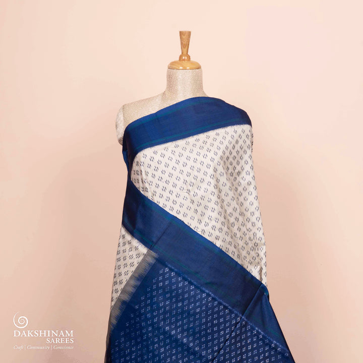 Pleats/body of Handwoven White with Blue Ikat silk Saree