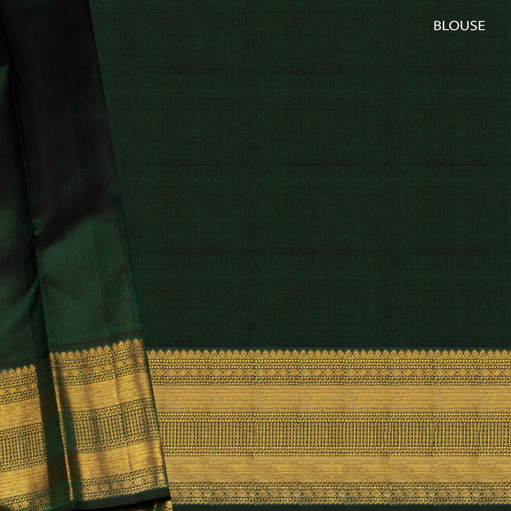 Blouse closeup of a Pink korvai Kanjivaram silk saree with green border.