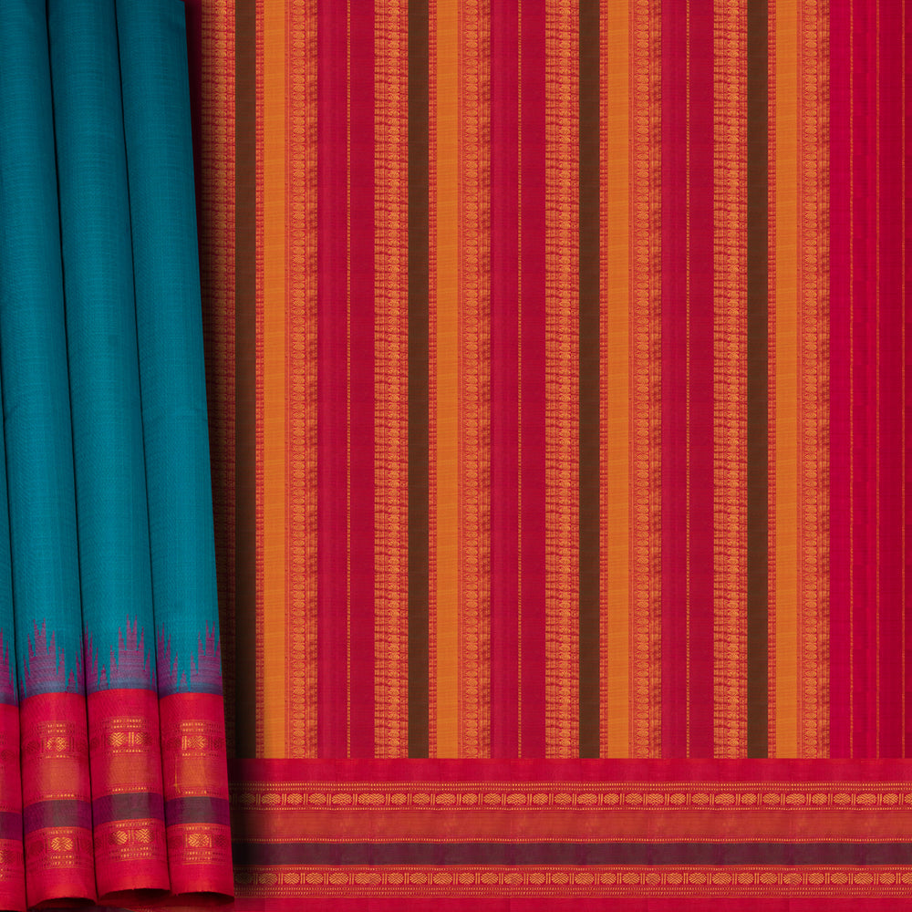 Closeup view of a Full view of a Blue Gadwal silk cotton saree with red dual-tone border.