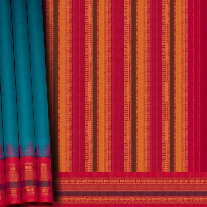Closeup view of a Full view of a Blue Gadwal silk cotton saree with red dual-tone border.