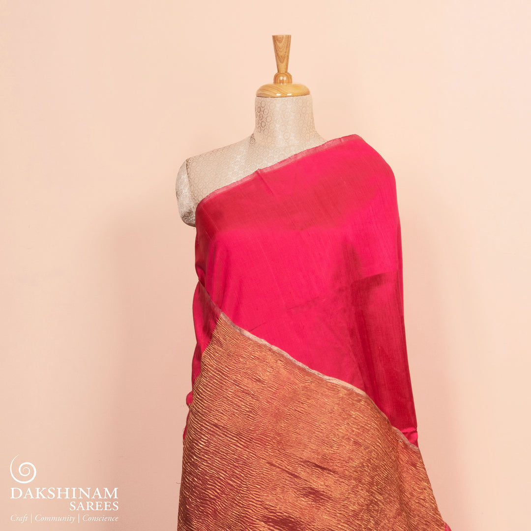 Full view of a Peach Dupion silk saree with crushed gold tissue pallu.