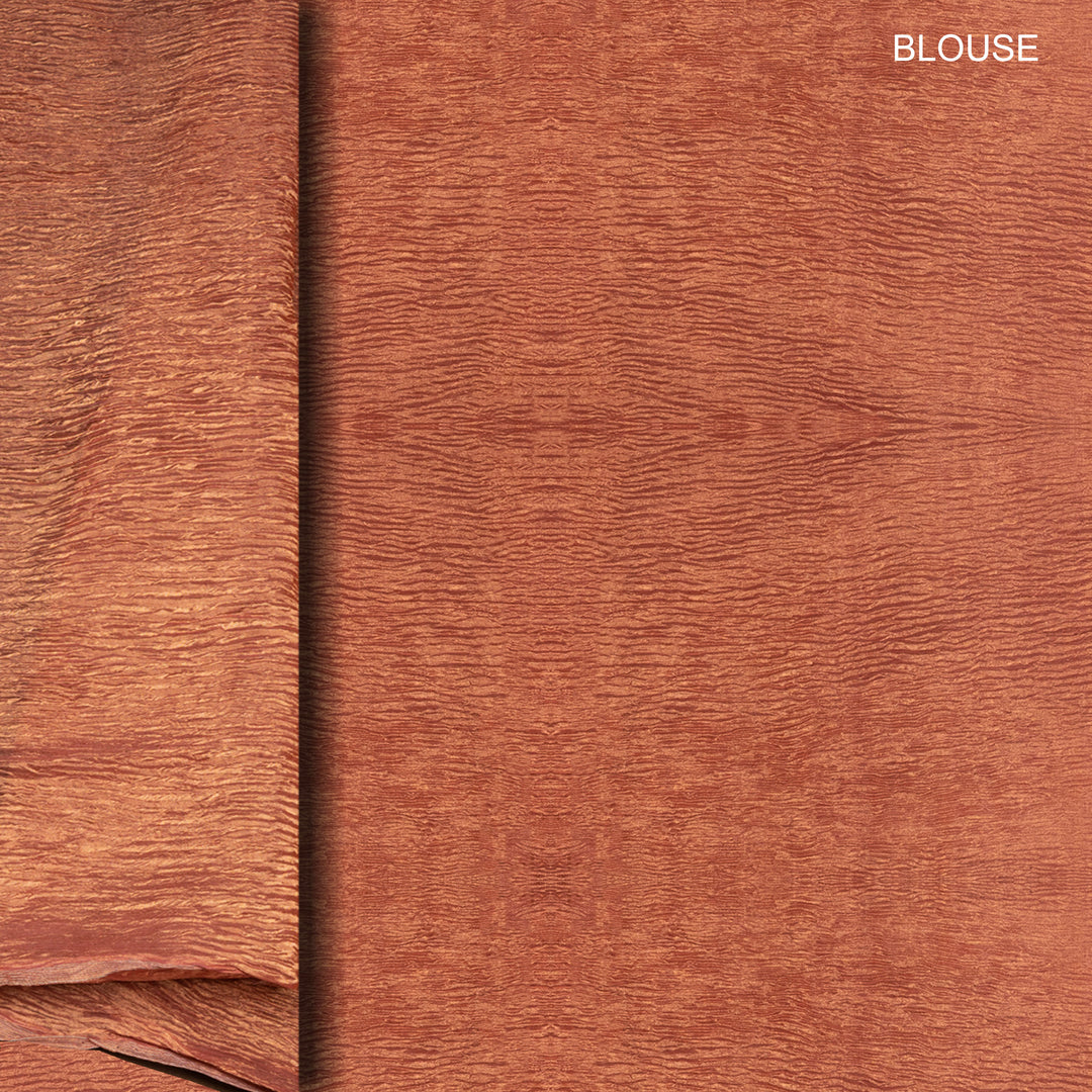 Blouse closeup of a Peach Dupion silk saree with crushed gold tissue pallu.
